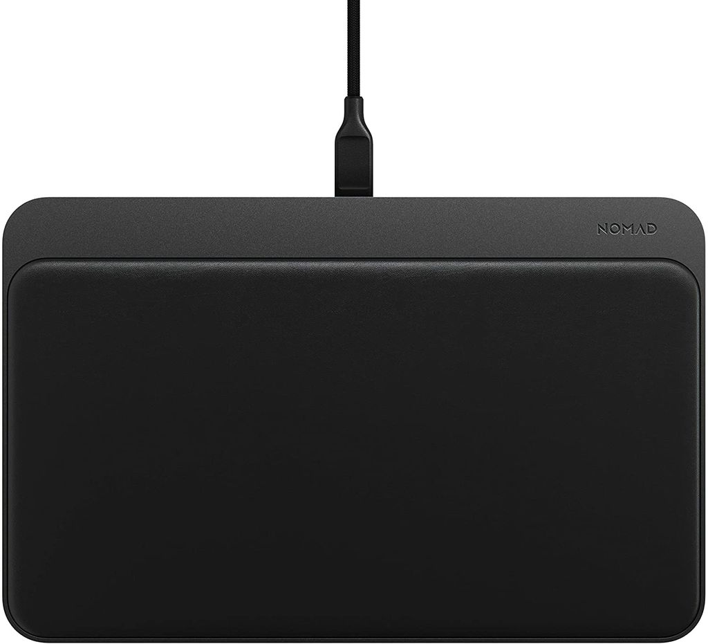A black Nomad Base Station Pro wireless charger is shown from a top-down perspective against a white background.