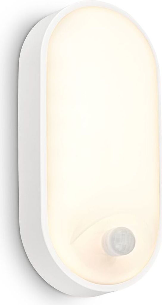 A white LED wall light with a motion sensor is mounted on a white wall.