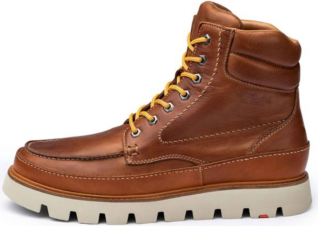 A side view of a brown leather boot with yellow laces against a white background.