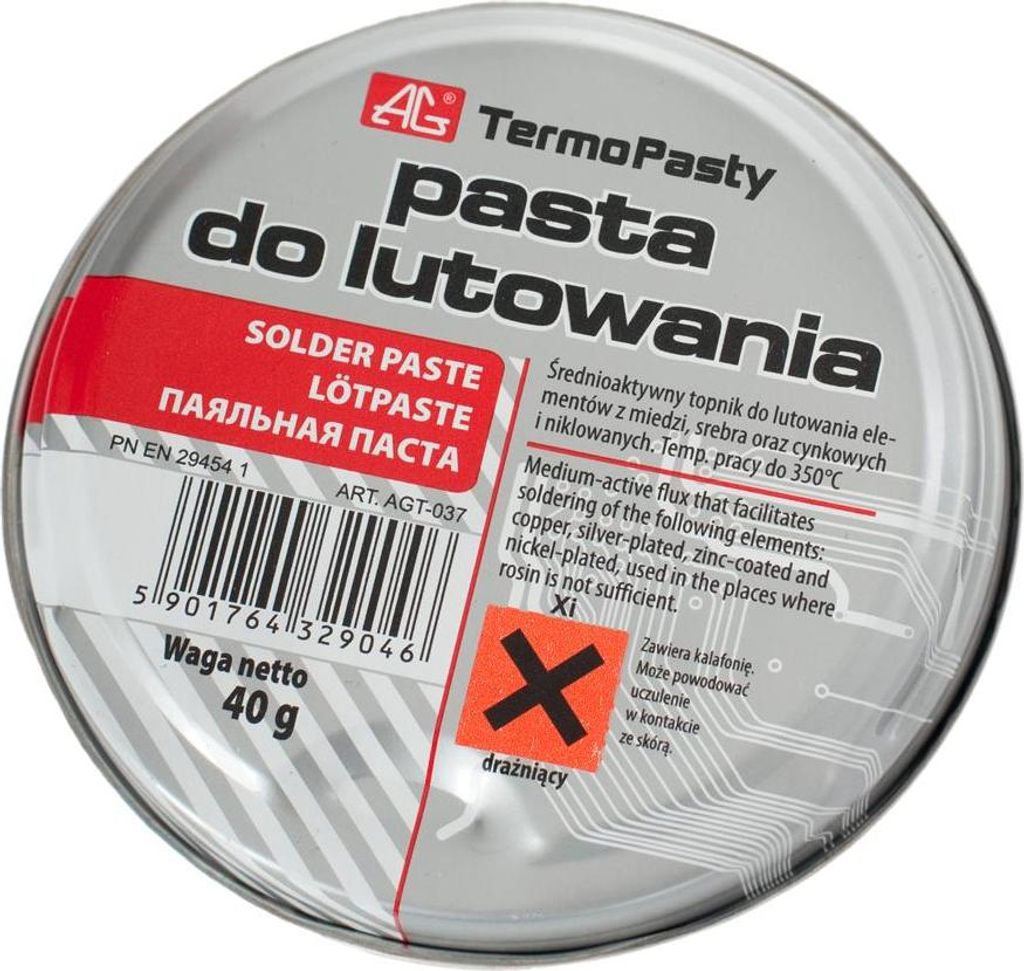 A round metal tin of solder paste.