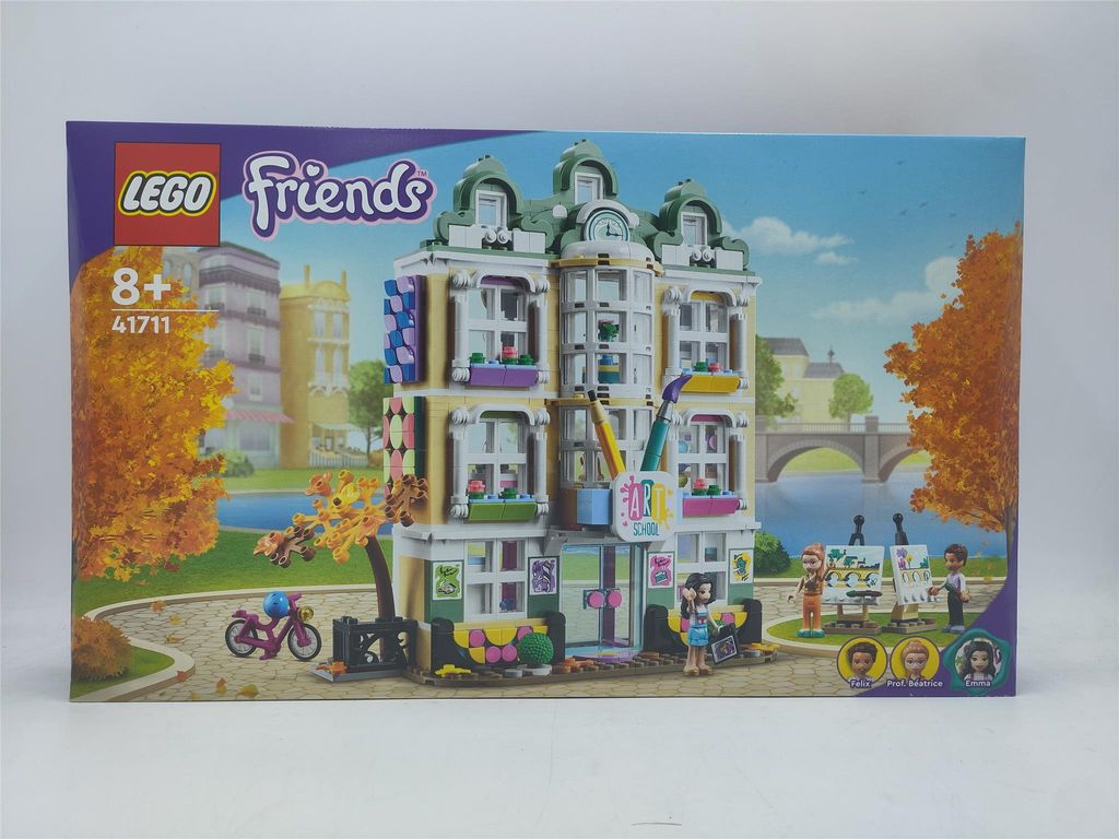 The image shows the box of a LEGO Friends Emma's Art School building set, with the LEGO Friends logo and product number visible.