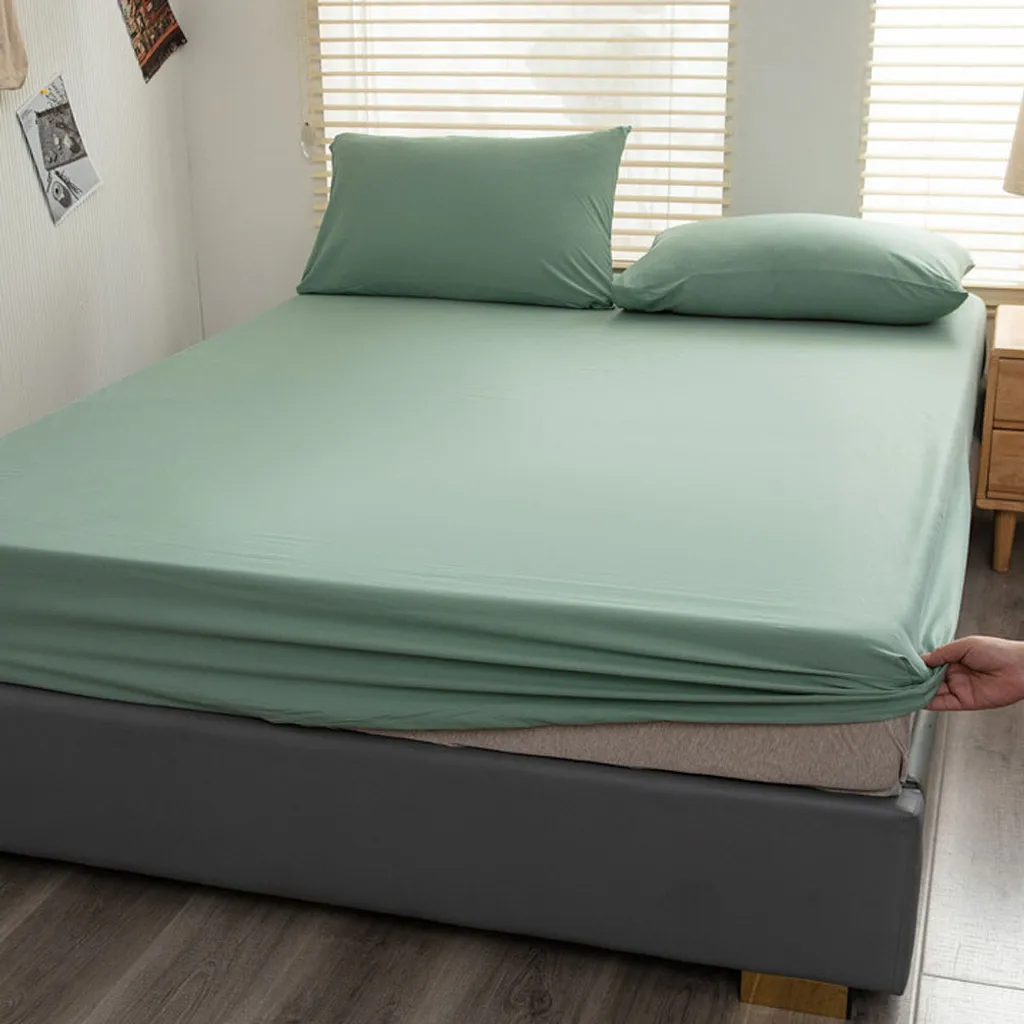 Drap housse coton 150x200 cm menthe : fini les draps qui glissent du lit