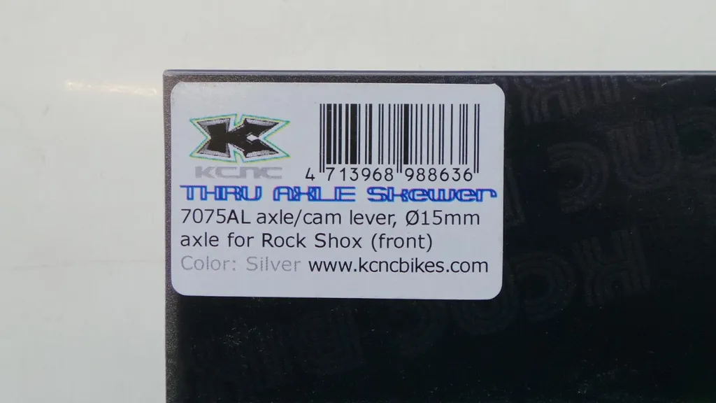 Axe de roue KCNC 100x15 mm argenté E-Thru rigide et ultra léger