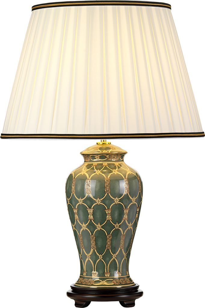 A table lamp with a pleated ivory shade and a decorative green ceramic base with gold accents.