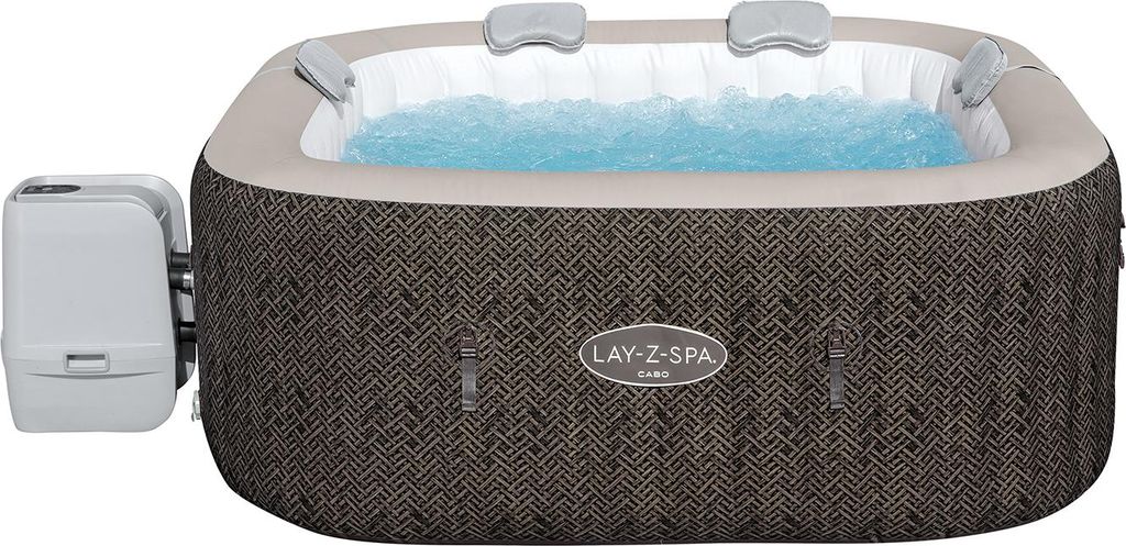 An inflatable hot tub filled with blue water, with a control unit attached to the side.