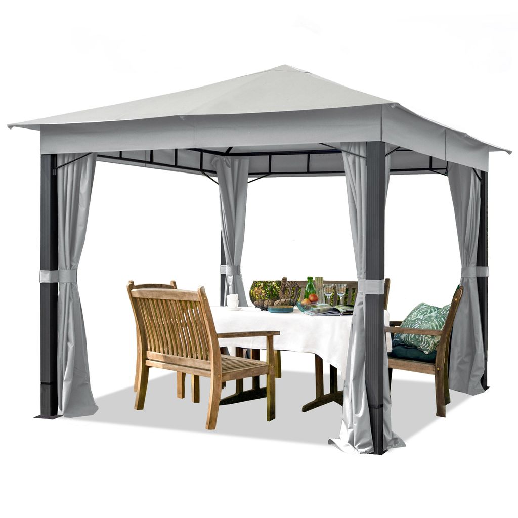 A gazebo with a table and chairs set up inside.