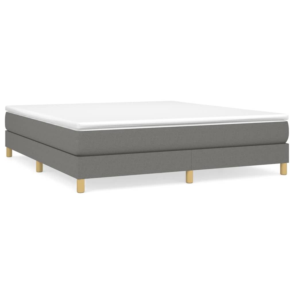 A bed frame with a mattress on top, isolated on a white background.