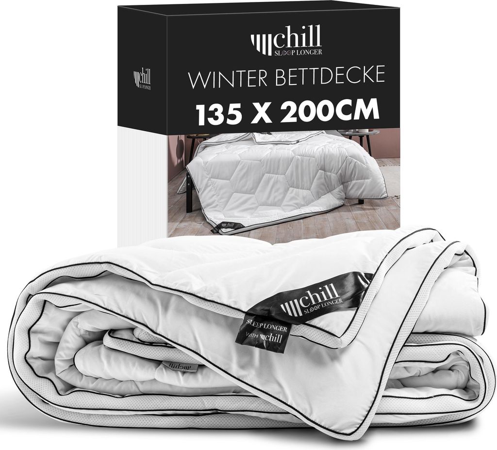 A product shot of a folded winter duvet and its packaging.