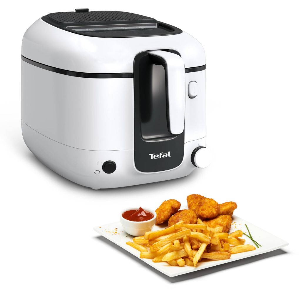 A white Tefal deep fryer is shown next to a plate of french fries and chicken nuggets with a small bowl of ketchup.