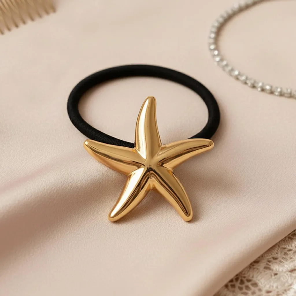 Elastico Capelli Marnie Stella Marina Oro: L'Accessorio Mare di Lusso