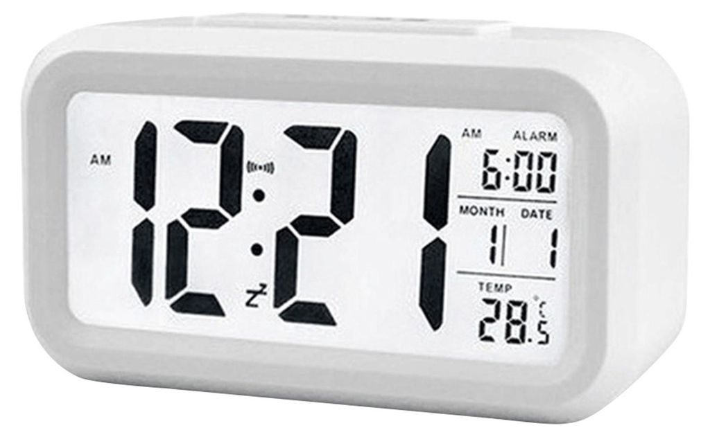 A digital alarm clock displaying the time, date, and temperature.