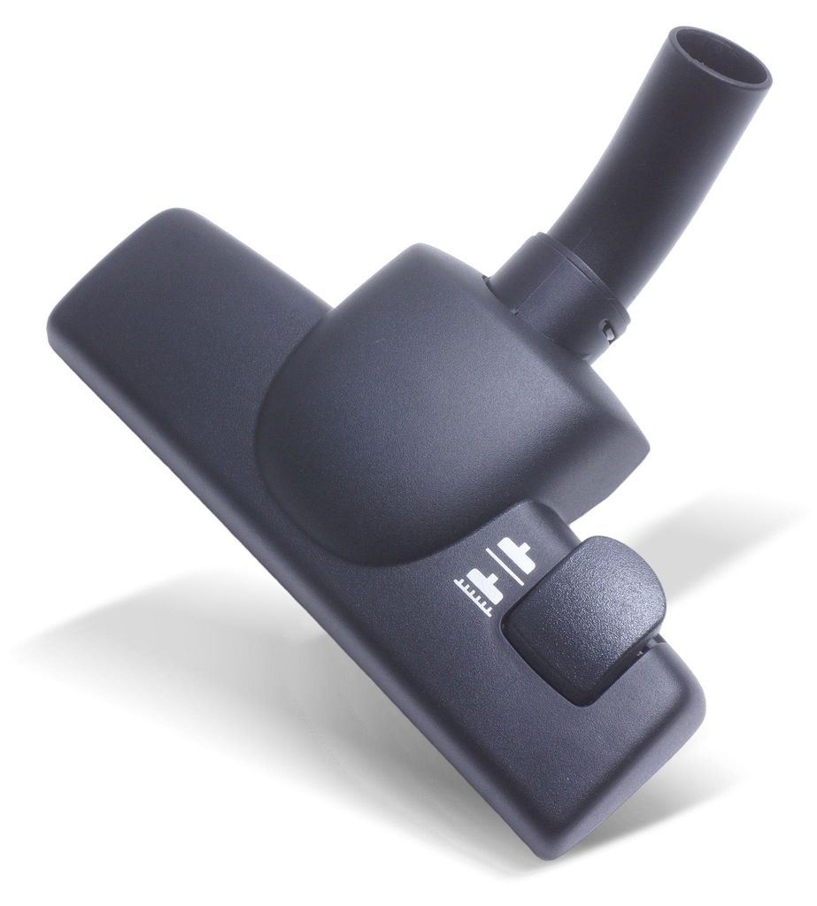 A dark gray vacuum cleaner nozzle is shown against a white background.