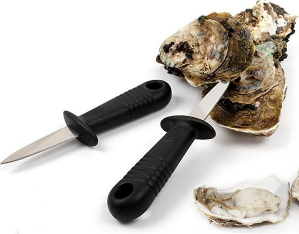 Two oyster knives and oysters on a white background.