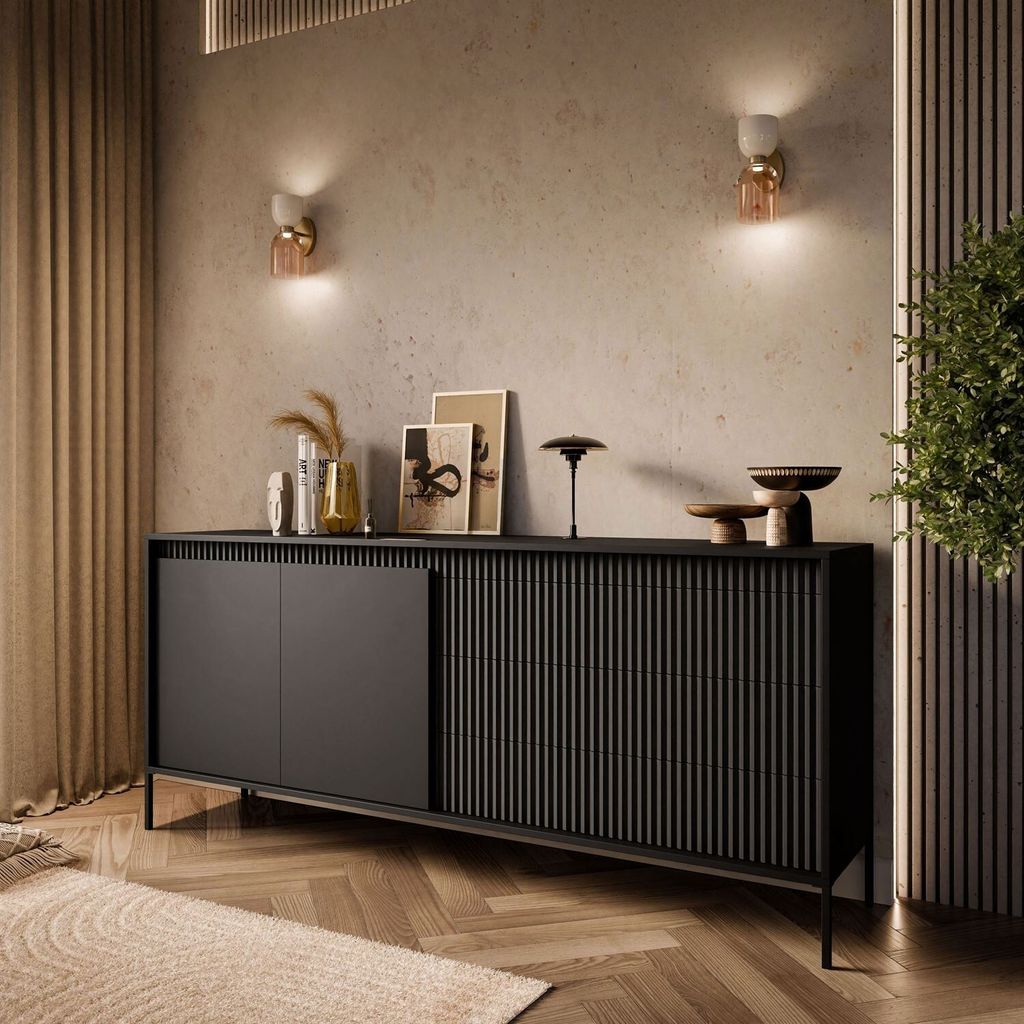 A modern living room with a black sideboard.