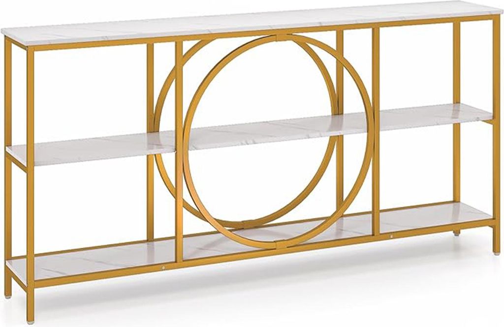 A three-tiered console table with a white marble-look top and shelves, supported by a gold metal frame. The table features a large decorative gold circle in the center.