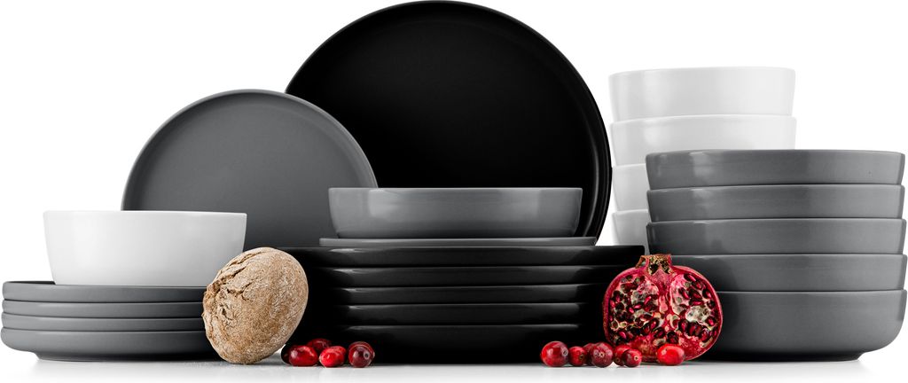 A collection of ceramic dishes in various sizes and colors, arranged on a white background.