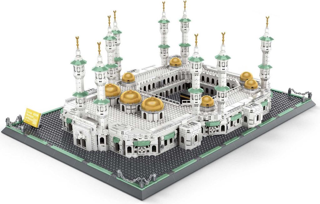 A detailed architectural model of the Grand Mosque of Mecca, likely a building block set, displayed on a gray base with a white background.