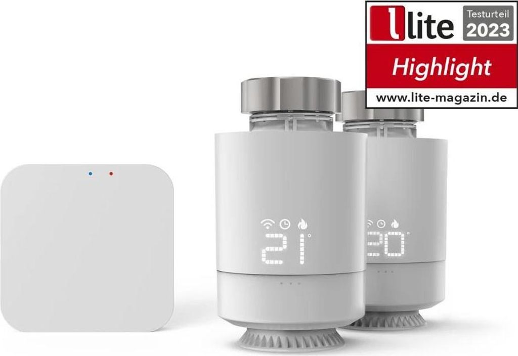 Two smart thermostats and a central hub are displayed against a white background.