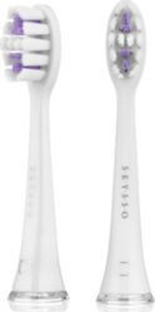 Two white toothbrush heads with purple bristles are shown against a white background.