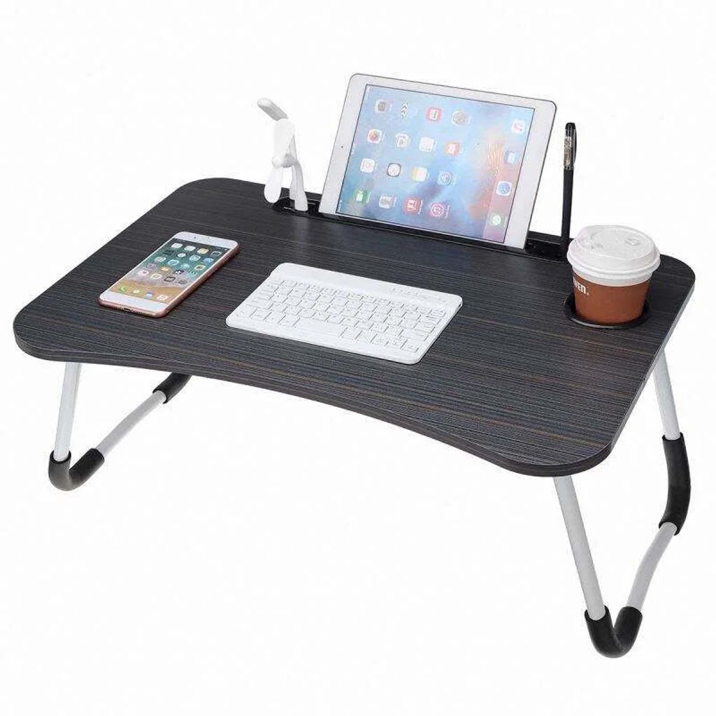 A portable lap desk with accessories on a white background.