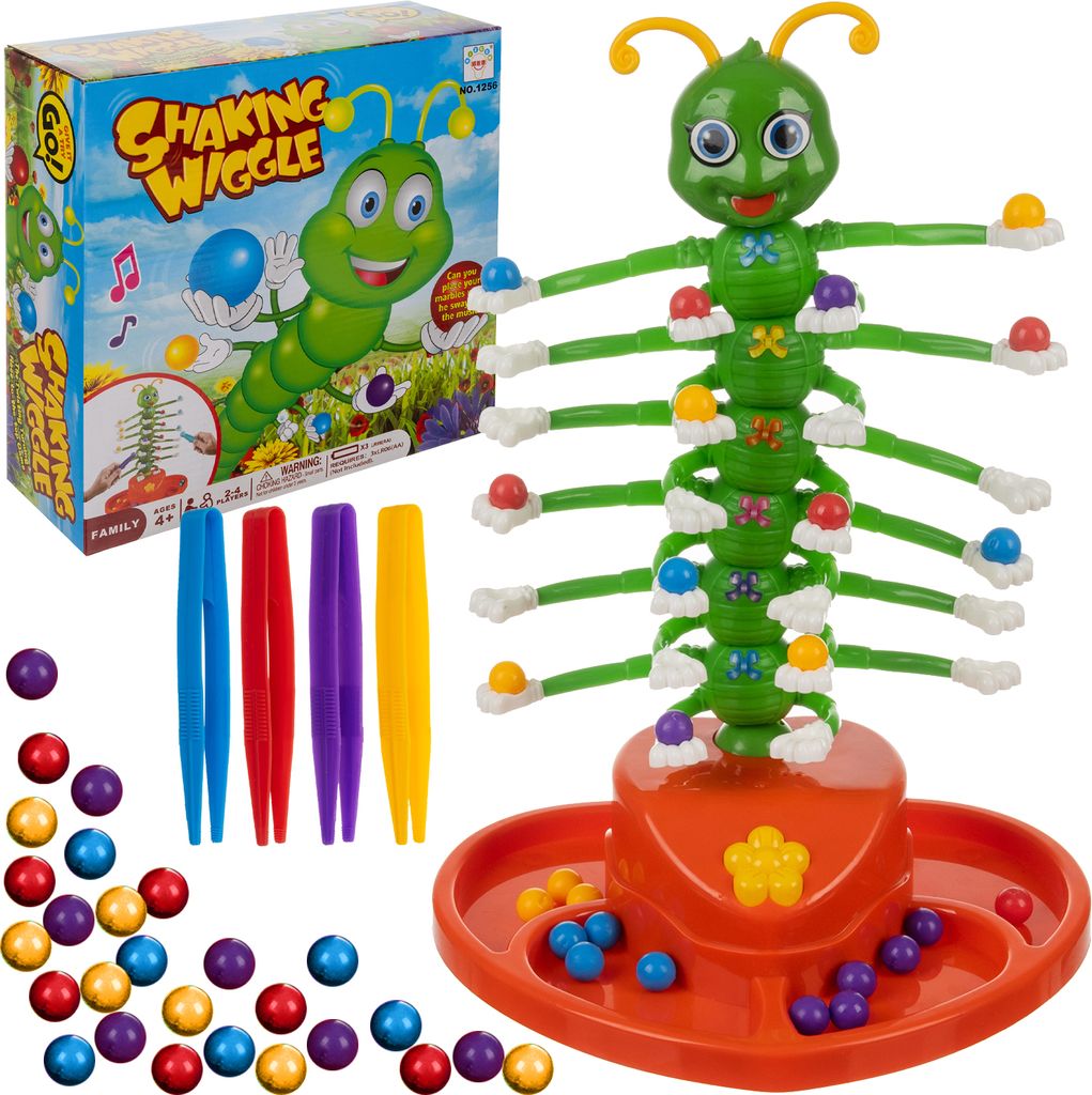 A children's dexterity game with a caterpillar-shaped tower and colorful balls, along with its packaging and accessories.