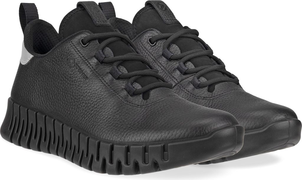 A pair of black ECCO sneakers on a white background.