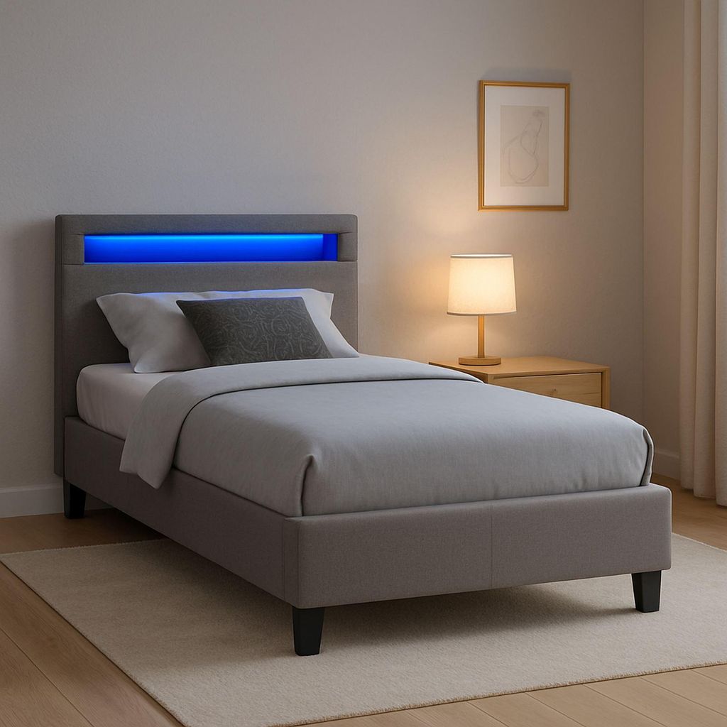 A bedroom scene with a bed, nightstand, and lamp.