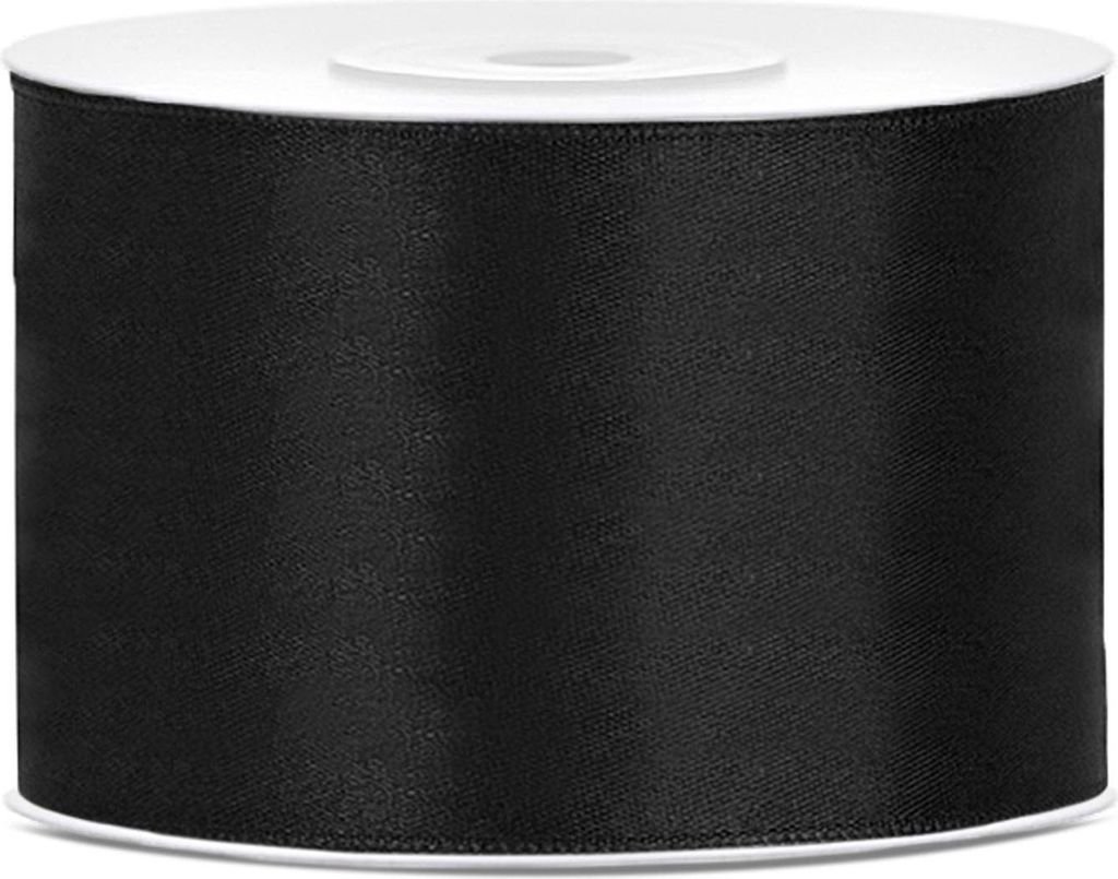 A roll of black satin ribbon on a white spool.