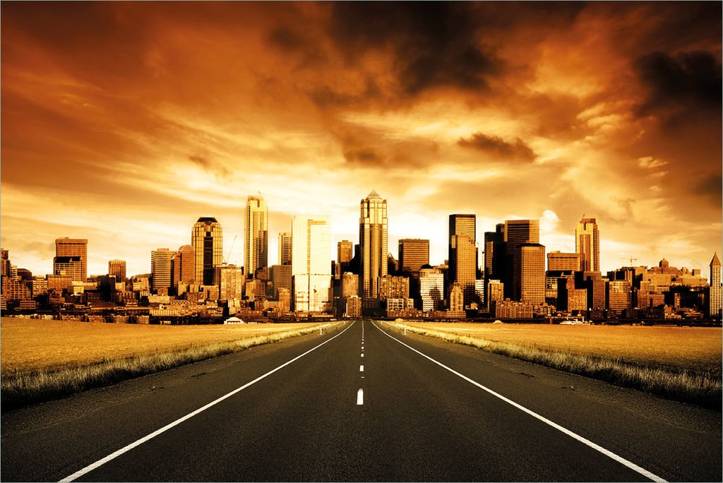 Wallario Premium Vliestapete Fototapete Skyline am Ende der Straße in der Größe 400 x 267 cm, extra dick, wird in 5 Teilen geliefert