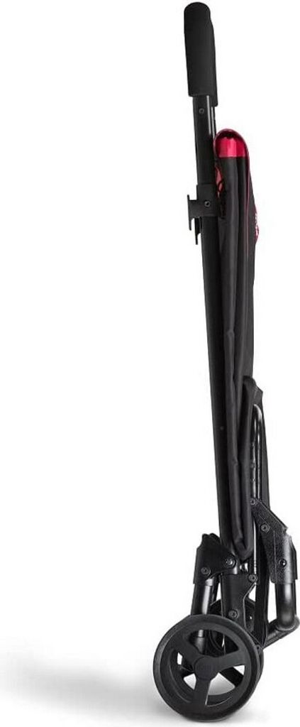 A folded black shopping trolley with red accents is shown in profile against a white background.