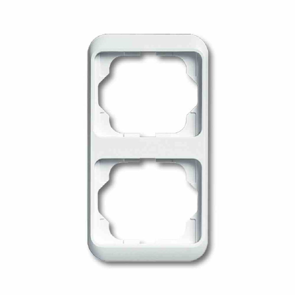 A white electrical outlet frame with two openings.