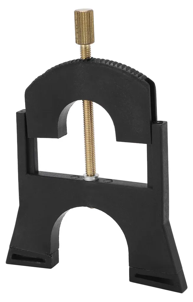 Outil pour changer le chevalet de violoncelle sans détendre les cordes