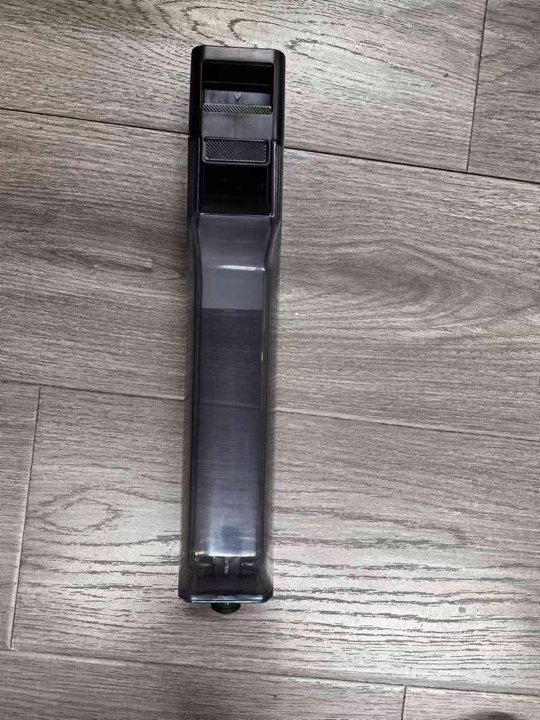 A black and gray water tank assembly for a Laresar M3 vacuum cleaner is shown on a wooden floor.