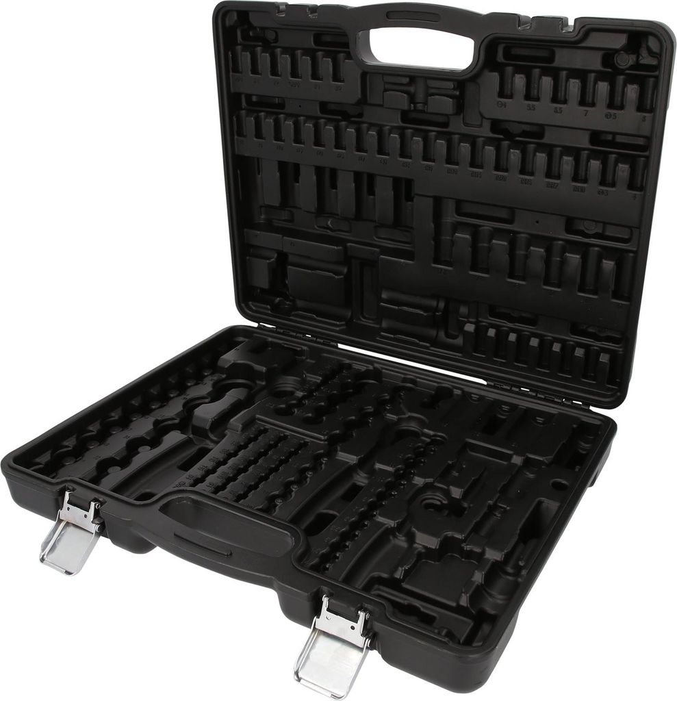 An open black plastic tool case with molded compartments for tools.