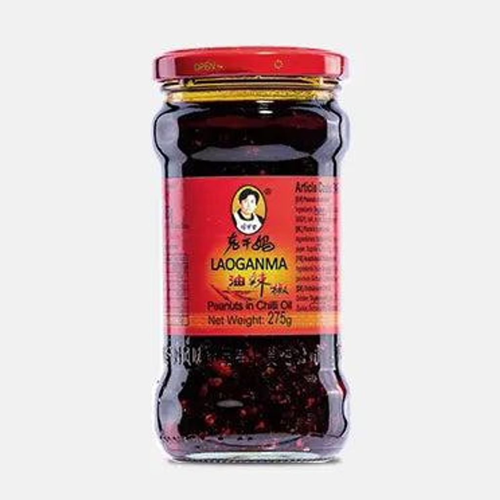 A jar of Laoganma chili oil with peanuts.