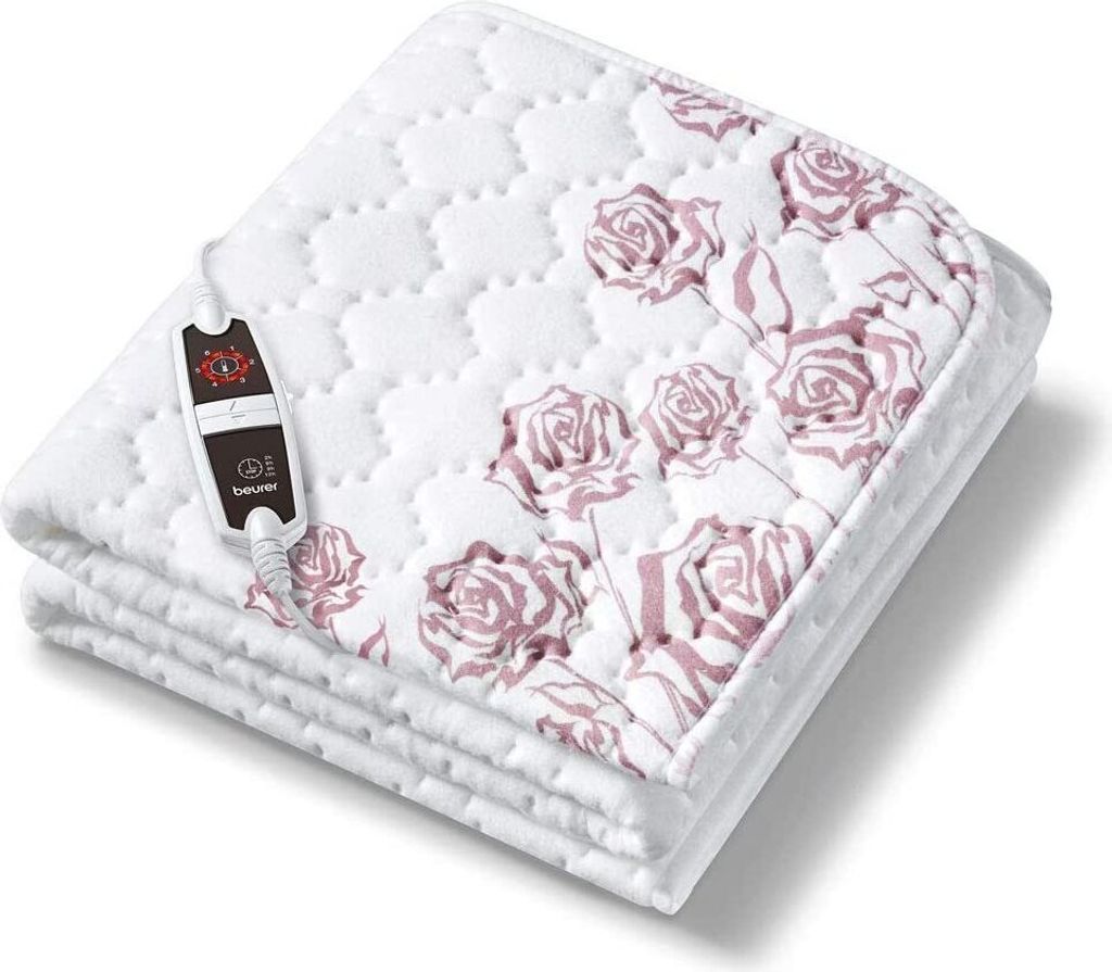 A folded electric blanket with a rose pattern and a controller.
