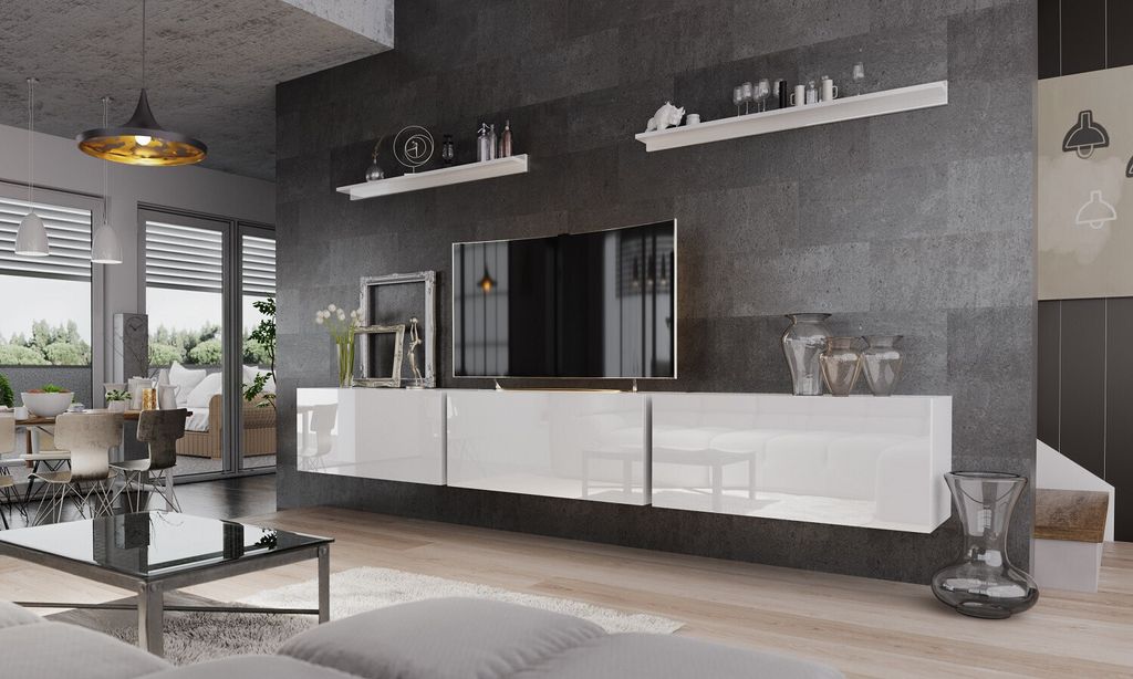 A modern living room with a TV unit, sofa, and dining area.
