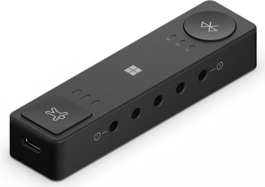 A black Microsoft Surface Adaptive Hub device shown from a diagonal angle on a white background.