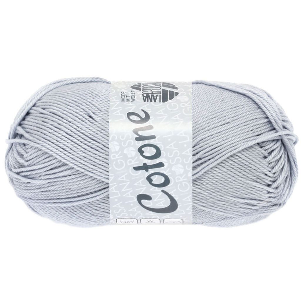 A ball of light gray yarn with a label wrapped around it.