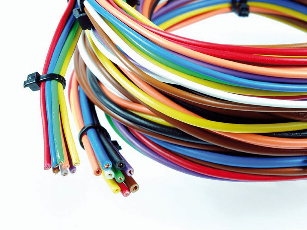 A bundle of colorful electrical wires coiled together.