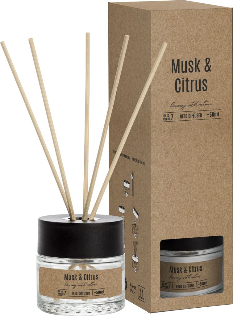 A reed diffuser with its packaging.