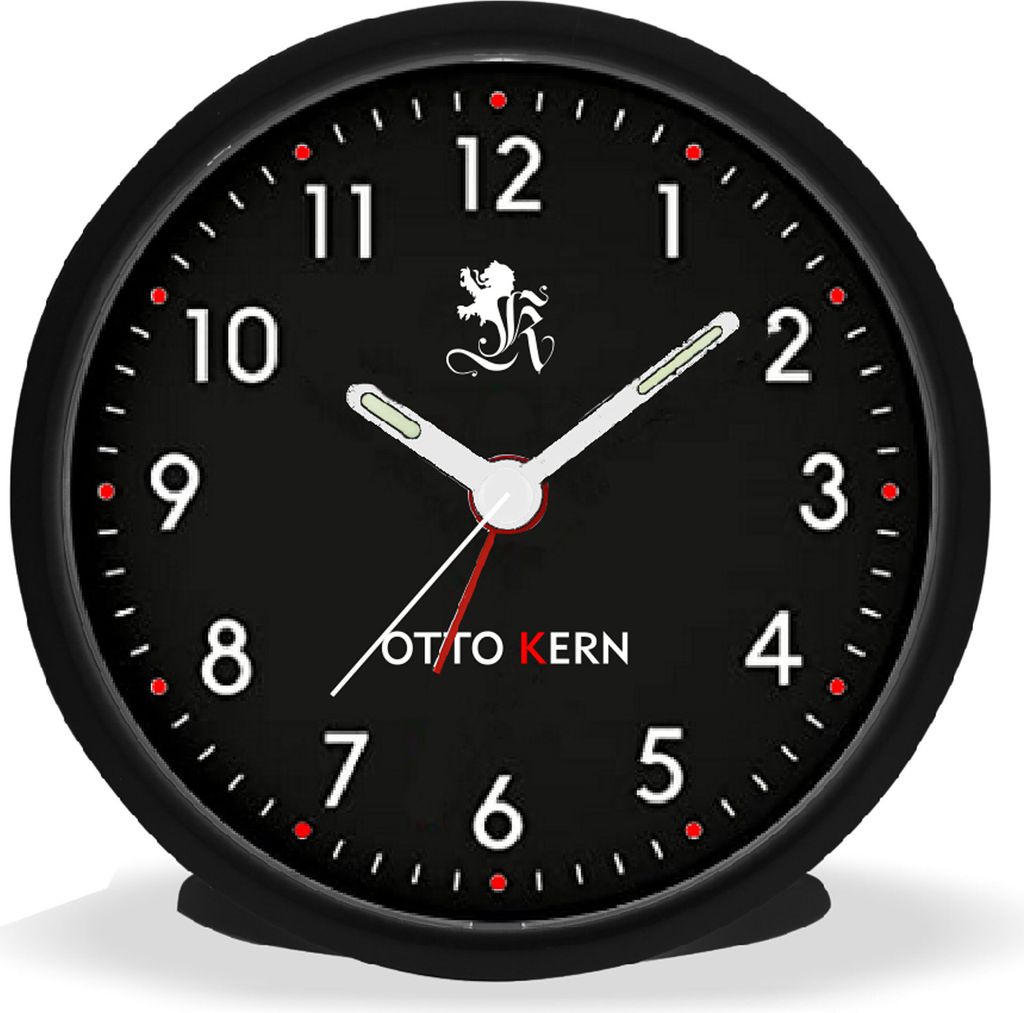 A close-up studio shot of a black analog alarm clock with white hands and numbers.