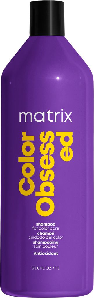 A studio shot of a large purple bottle of Matrix Total Results Color Obsessed Shampoo.