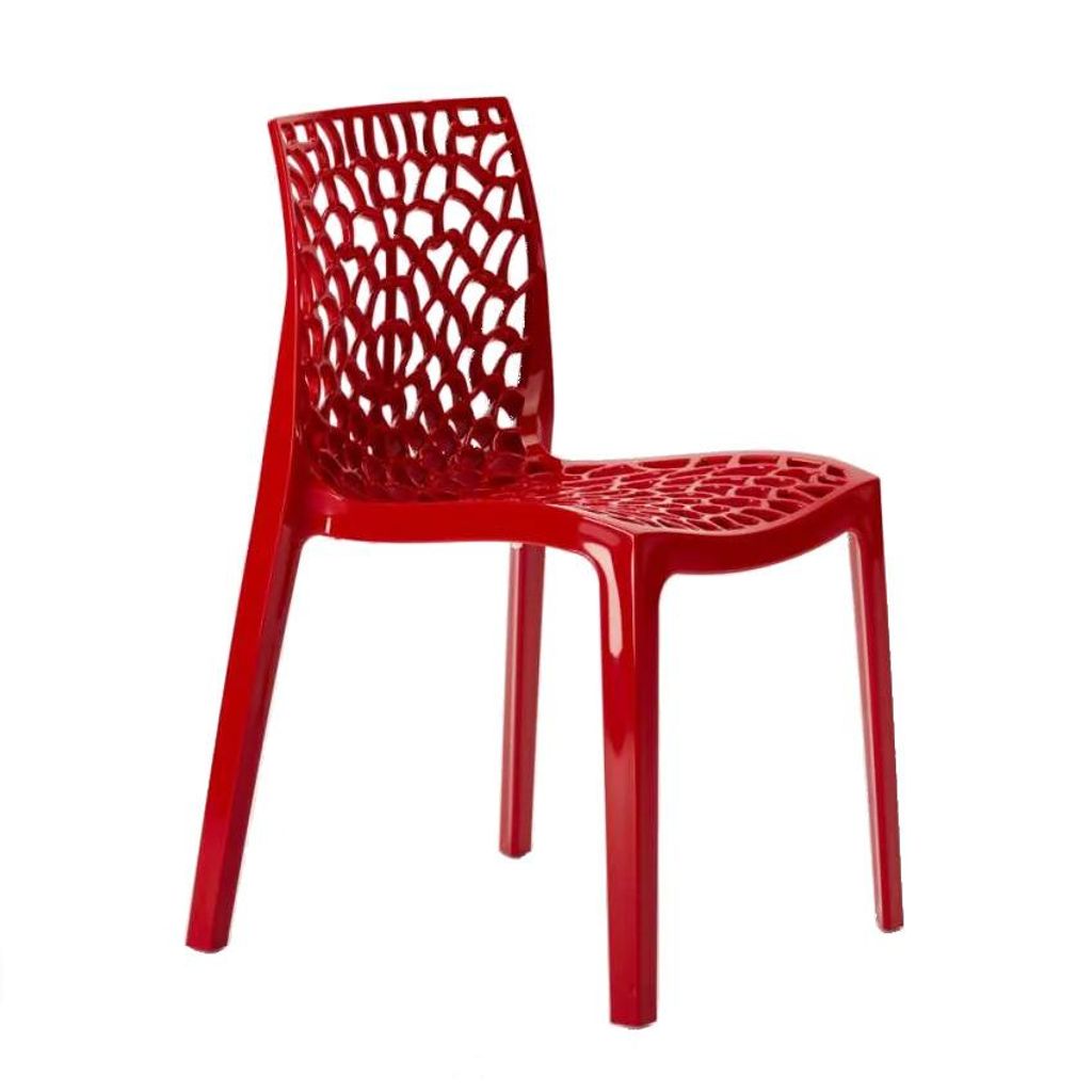 A red plastic chair with a web-like design on the back and seat, isolated on a white background.