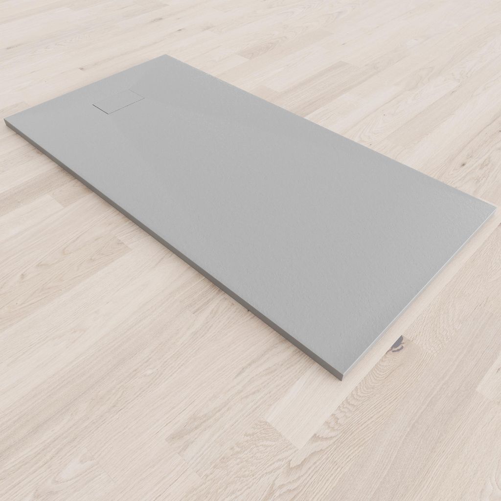 A flat, gray shower tray is placed on a light wood-look floor.