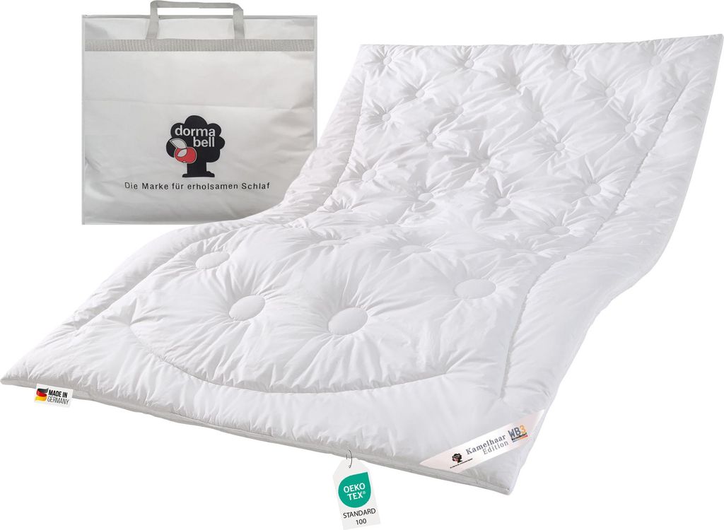 A white duvet and a white storage bag are displayed against a white background.