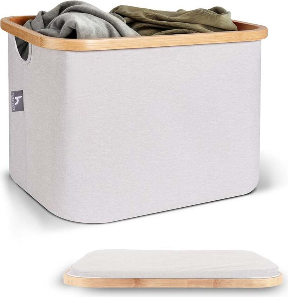 A laundry basket filled with clothes, with a separate lid shown below.