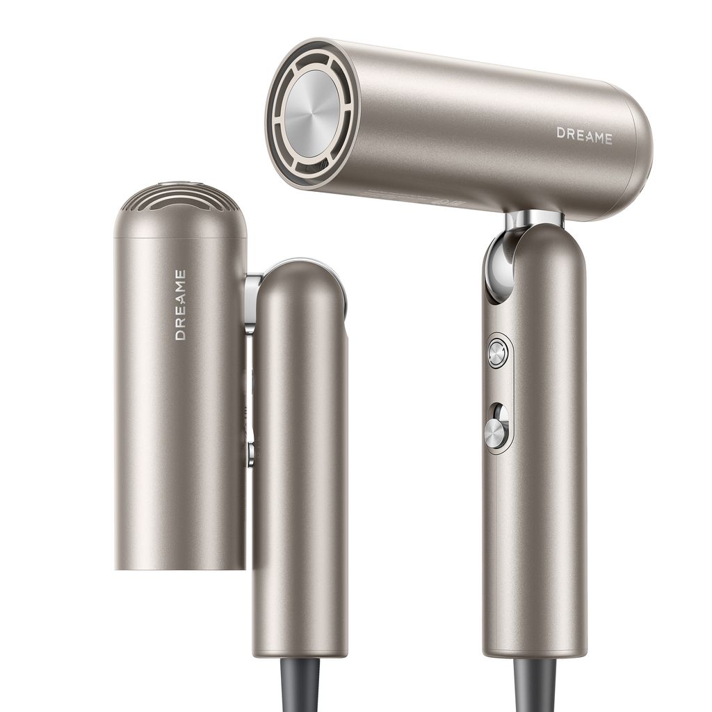 A studio shot of a gold-colored hair dryer against a white background.
