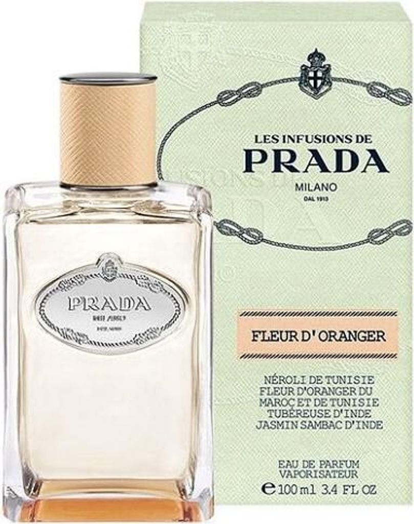 A bottle of Prada Les Infusions Fleur d Oranger Eau de Parfum and its packaging.