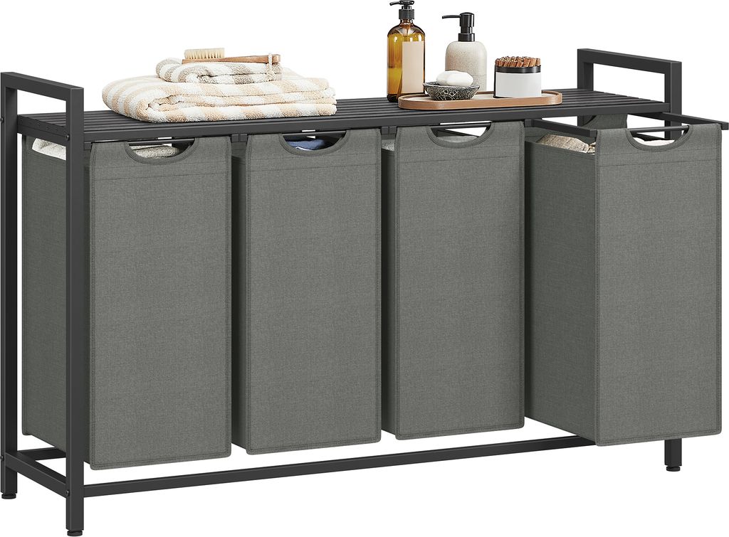 A laundry sorter with four compartments and a shelf on top, holding towels and toiletries.